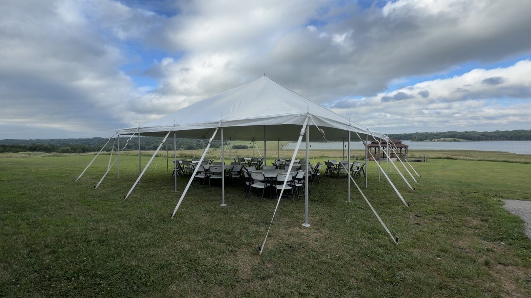 Event tent setup overlooking the water