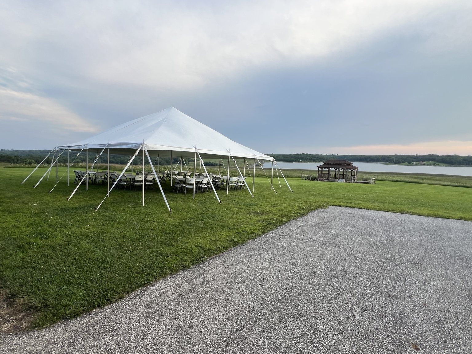 Event tent setup overlooking the water
