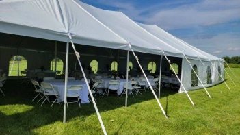 Event tent with sidewalls and tables